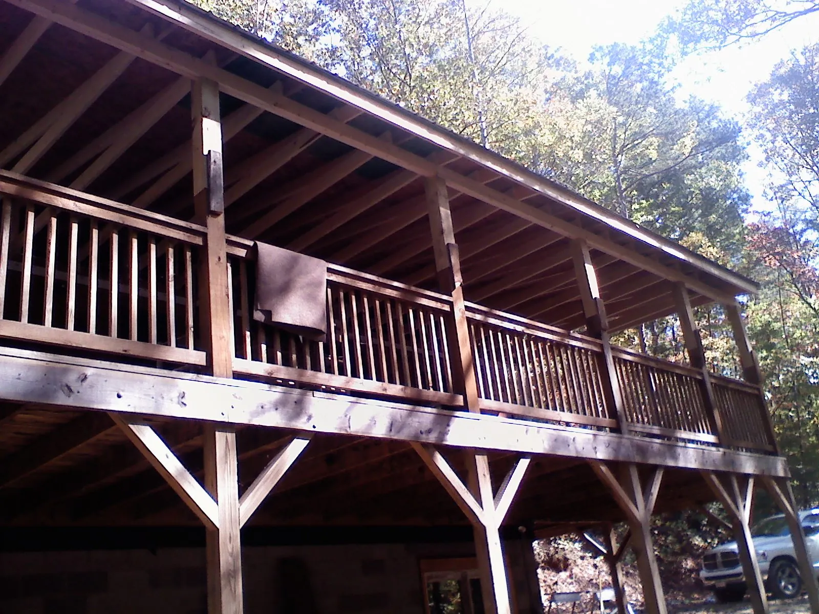 Timber framing under a new elevated porch and deck — Roof Leak Repair in Fort Laramie by Roofing Brothers